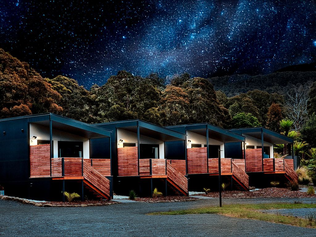 The pods at Mt Field Retreat at night under the Milky Way
